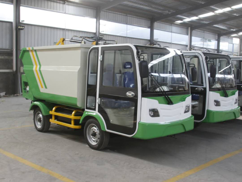 電(diàn)動四輪後挂桶車1.jpg 電(diàn)動四輪後挂桶車1.jpg
